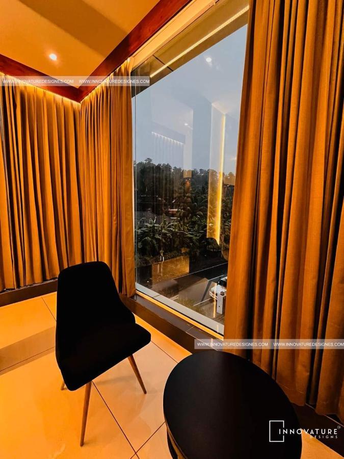 Hotel 24Inn Residency Pathanāmthitta Extérieur photo