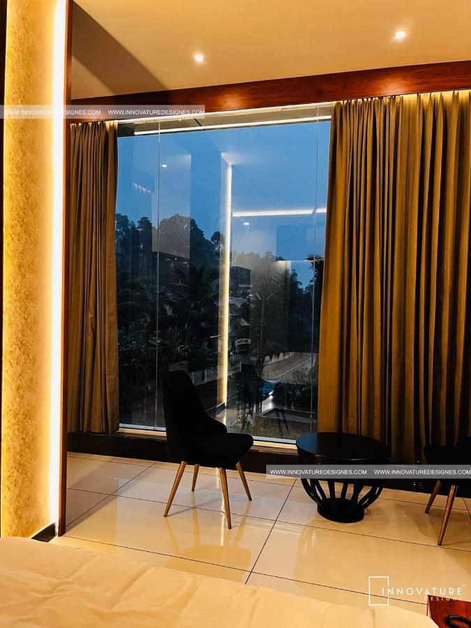 Hotel 24Inn Residency Pathanāmthitta Extérieur photo
